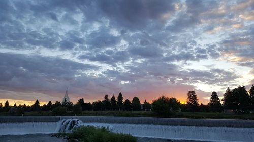 Scenic view of dramatic sky over landscape