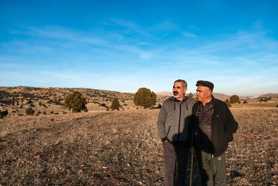 Full length of man standing against sky