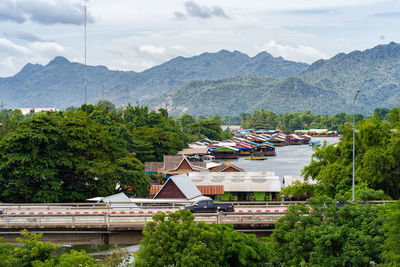 High angle view of buildings and mountains against sky