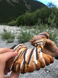 Midsection of man holding ice cream