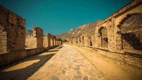 View of old ruins against clear sky