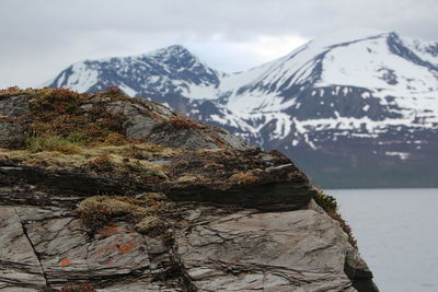 Scenic view of lake with mountains in background