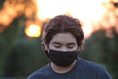 Close-up portrait of young man outdoors