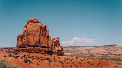 Rock formations against blue sky