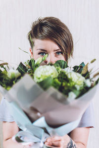 Portrait of woman holding food