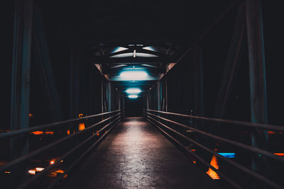 Illuminated corridor at night