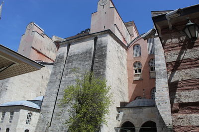 Low angle view of historic building against sky