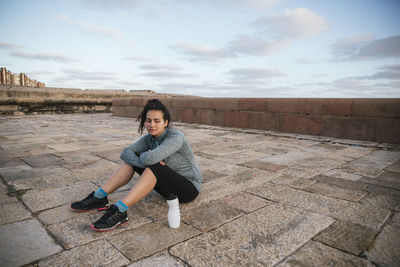 Tired girl resting after exercise