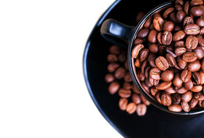 High angle view of coffee beans in bowl