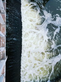 Blurred motion of water splashing on rocks