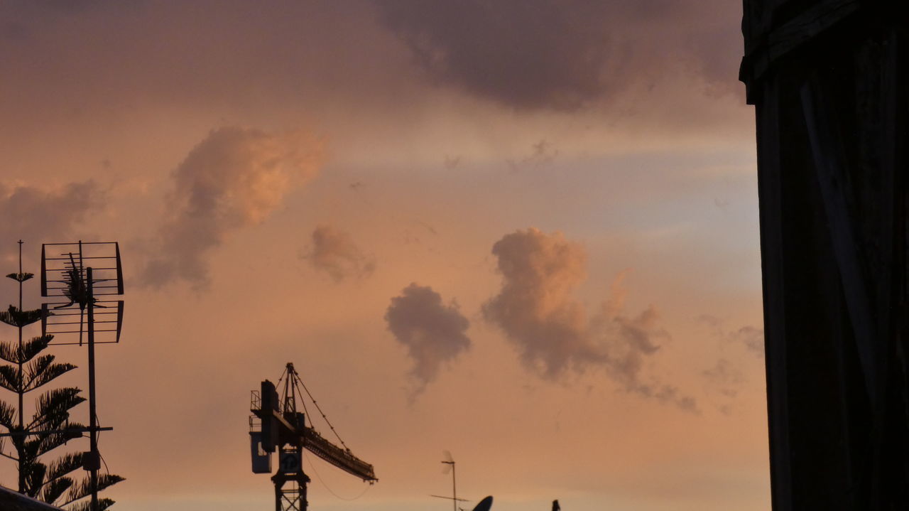 LOW ANGLE VIEW OF SILHOUETTE TELEPHONE POLE AGAINST SKY DURING SUNSET