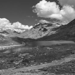 Scenic view of snowcapped mountains and lake against sky
