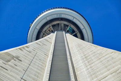 Low angle view of building against clear blue sky