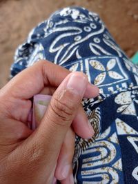 Close-up of woman finger with torn skin