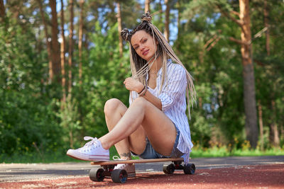 Woman sitting in park