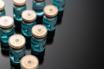 High angle view of bottles on table