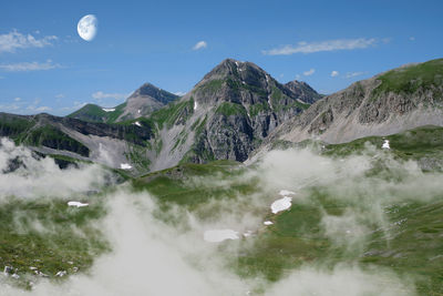 Mountains of abruzzo with fog and moon