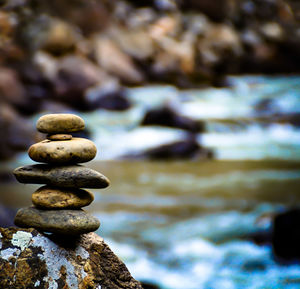 Close-up of stone stack on rock