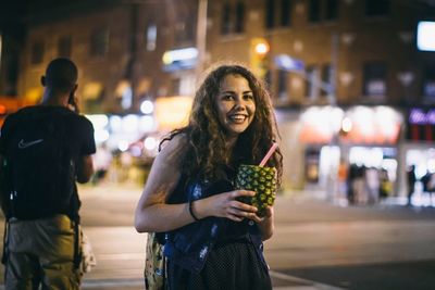 Portrait of smiling young woman