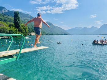 Rear view of woman in sea