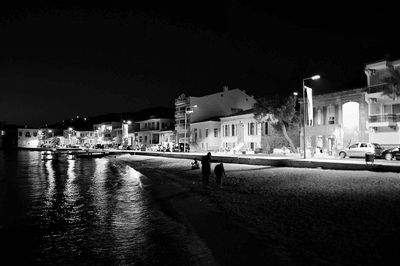 Buildings in city at night