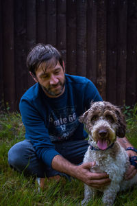 Portrait of man with dog