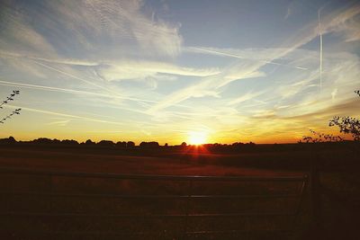 Scenic view of landscape at sunset