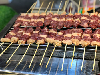 Close-up of meat on barbecue grill