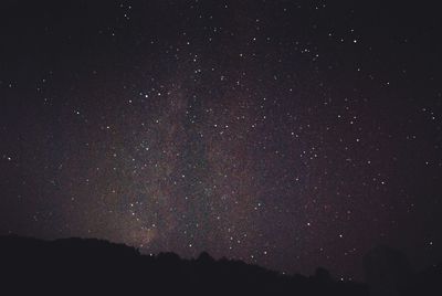 Low angle view of stars in sky at night