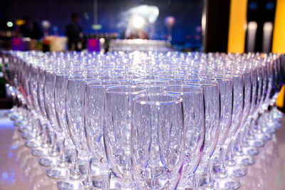 Close-up of glass bottles on table in restaurant