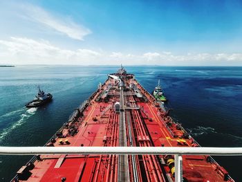 High angle view of ship sailing in sea against sky