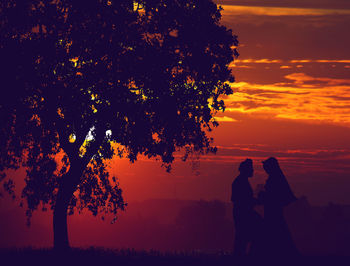 Silhouette tree against sky during sunset