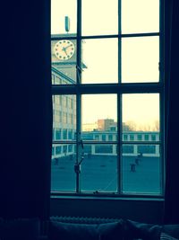 Cityscape seen through window