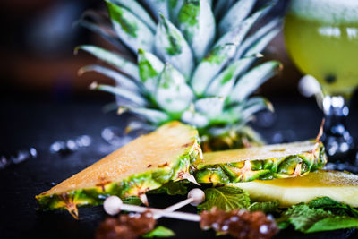 Close-up of fruits served on cutting board