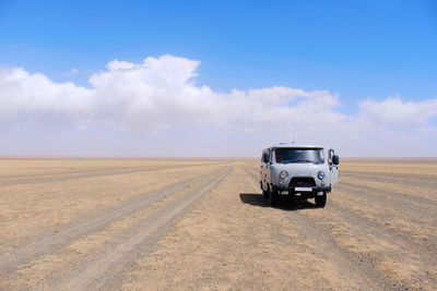 Russia van with landscape view at gobi desert nationalpark at mongolia.