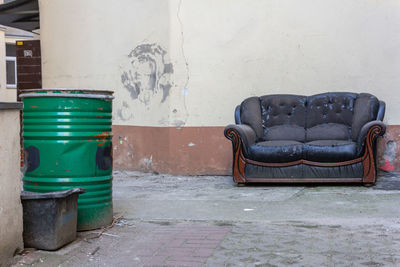 Empty chair in abandoned room