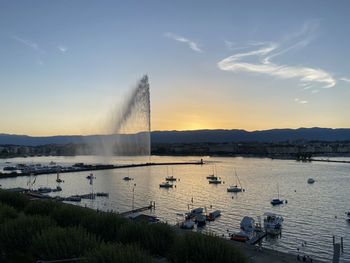 Scenic view of lake against sky during sunset