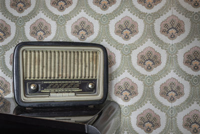 High angle view of old camera on table