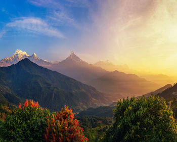 Scenic view of mountains against sky during sunset