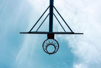 Street basketball hoop and blue sky