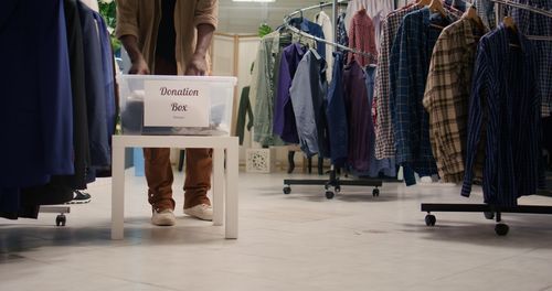 Low section of people standing in store