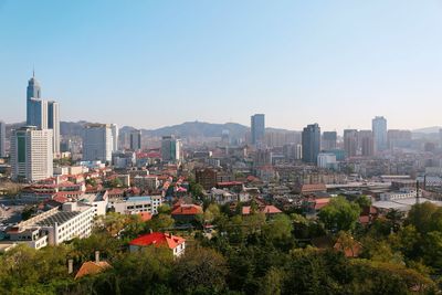 View of cityscape against clear sky