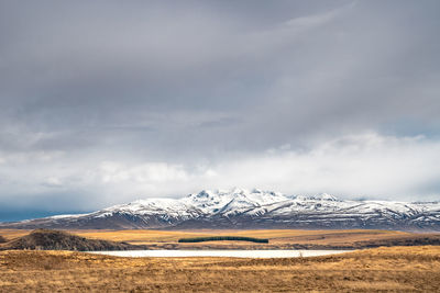 Scenic view of lake tekapo east bank. beautiful view driving along the lilybank road in lake tekapo.