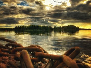 Scenic view of lake against sky during sunset