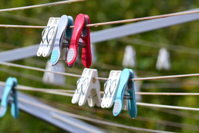 Close-up of clothes hanging on rope