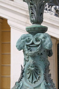 Low angle view of statue against building