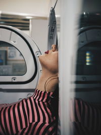 Close-up of man in train