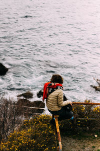 Rear view of woman looking at sea