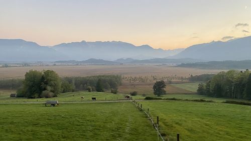 Scenic view of landscape against sky during sunset