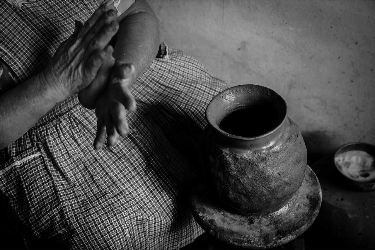 black, darkness, black and white, one person, monochrome, monochrome photography, hand, adult, indoors, white, high angle view, men, poverty, food and drink